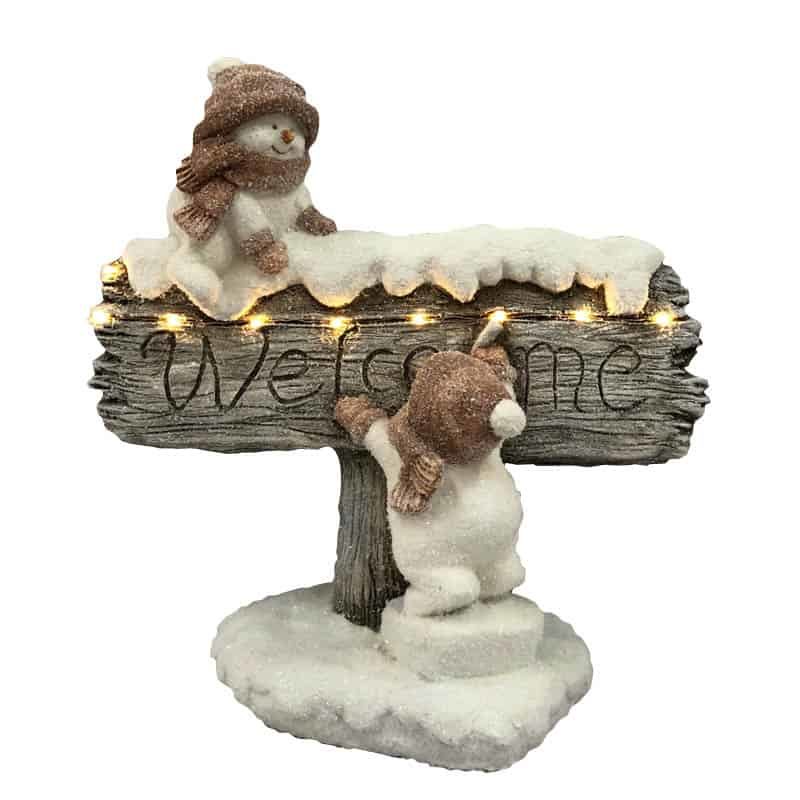 Sneeuwmannen bij "Welcome" bord  met LED